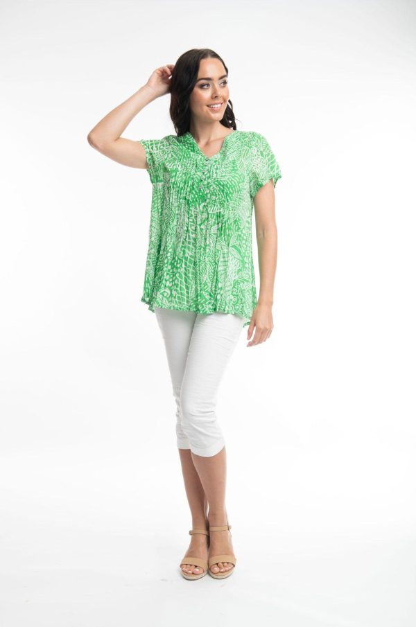Orientique: green and white print skirt